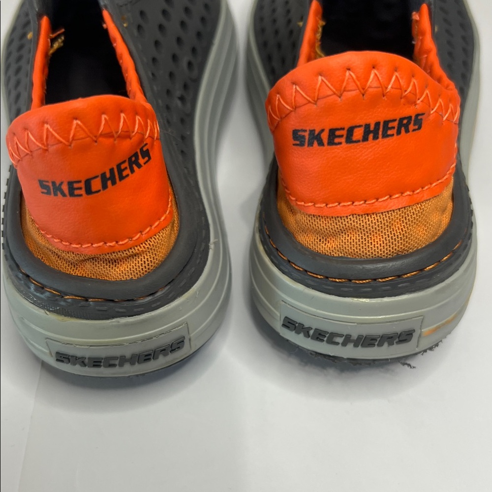 Skechers Kids Black and Orange Slip-On Sneakers - Picture 2 of 10